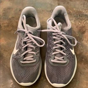 Gray Nike Skylux running shoes